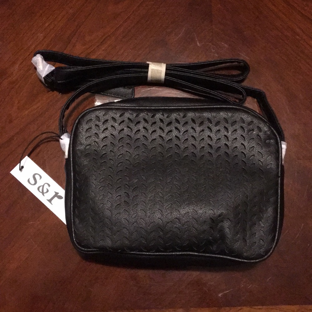 Laser cut detailed crossbody bag!